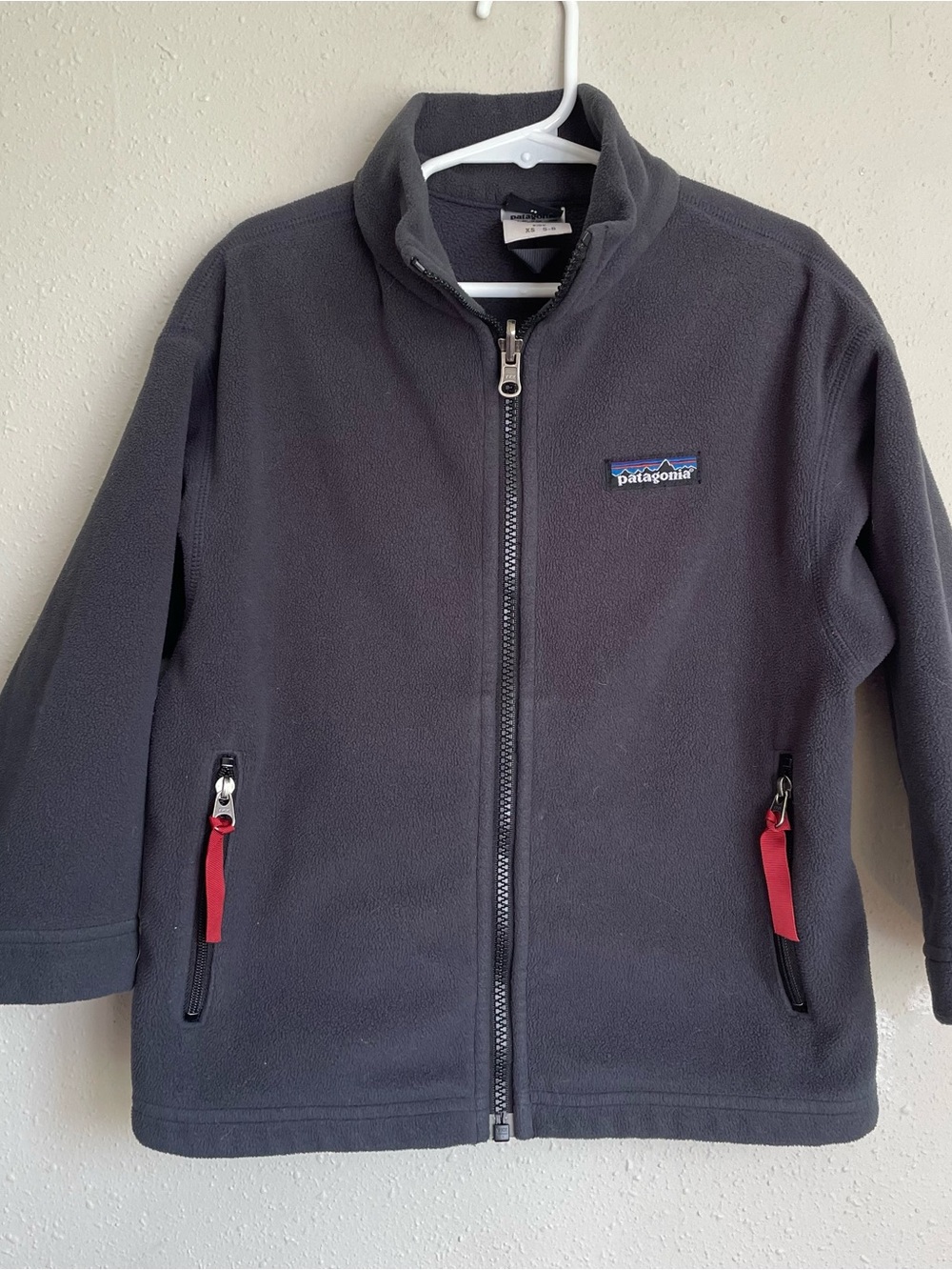 Patagonia Kids Gray Fleece Jacket with Red Zip Tabs